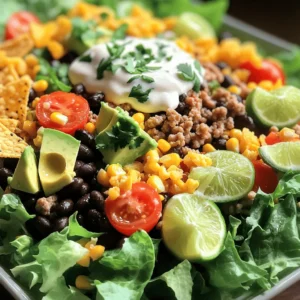 To make a tasty Loaded Taco Salad, gather these key ingredients: - 1 lb ground turkey or beef - 1 packet (1.25 oz) taco seasoning - 1 can (15 oz) black beans, rinsed and drained - 1 cup corn kernels, cooked or frozen - 4 cups romaine lettuce, chopped - 1 cup cherry tomatoes, halved - 1 ripe avocado, diced - 1 cup shredded sharp cheddar cheese - ½ cup sour cream or Greek yogurt - ¼ cup fresh cilantro, chopped - 1 lime, juiced - Tortilla chips for crunch - Salt and pepper to taste These ingredients combine to create a fresh and filling dish. The ground meat adds protein, while beans and corn bring fiber. Lettuce and veggies keep it light and crisp. You can customize your salad with optional garnishes. Here are some ideas: - Sliced jalapeños for heat - Diced red onion for a sharp bite - Black olives for extra flavor - Additional lime wedges for zesty goodness - Hot sauce for those who like it spicy Feel free to mix and match toppings. This way, you can make the salad your own. Loaded Taco Salad is not just tasty; it's also nutritious! Here’s a quick look at its benefits: - Protein: High from meat and beans - Fiber: Found in beans, corn, and veggies - Vitamins: Plenty from fresh produce like lettuce, tomatoes, and avocado - Healthy Fats: From avocado and cheese Each serving typically has around 400-500 calories. This can vary, based on your chosen ingredients. Check the Full Recipe for exact details! Start by heating a large skillet over medium heat. Add 1 pound of ground turkey or beef. Cook it until it is brown, around 6 to 8 minutes. Use a spatula to break the meat into smaller bits as it cooks. Once the meat is browned, drain any extra fat from the skillet. Now, stir in 1 packet of taco seasoning and the water as the packet states, usually about 2/3 cup. Let it simmer for about 5 minutes. Stir occasionally until the mix thickens and smells great. While the meat cooks, prepare the salad base. In a large bowl, add 4 cups of chopped romaine lettuce, 1 can of black beans (rinsed and drained), 1 cup of corn (your choice), and 1 cup of halved cherry tomatoes. Then, add 1 diced avocado. Toss these fresh ingredients gently. Make sure they mix well but stay intact. Once the meat is ready, add it to the bowl with the salad. Sprinkle 1 cup of shredded sharp cheddar cheese over the top. For the dressing, take a small bowl and mix ½ cup of sour cream or Greek yogurt with the juice of 1 lime. Add a pinch of salt and pepper. Stir until the dressing is smooth. Drizzle the dressing over the salad and toss everything together. Finish by adding ¼ cup of chopped fresh cilantro and crumbled tortilla chips for that perfect crunch. Enjoy every bite of your loaded taco salad! For the full recipe, check out the detailed instructions. To cook the ground meat well, use a large skillet. Heat it on medium. Add the meat and break it apart with a spatula. Cook until the meat is brown, about 6-8 minutes. Drain excess fat for a leaner dish. Add taco seasoning and water. Let it simmer for five minutes. This makes the meat flavorful and juicy. Fresh ingredients make a big difference. Choose ripe avocados and bright cherry tomatoes. Use crisp romaine lettuce for a nice crunch. If you can, buy fresh corn. It adds a sweet, juicy bite. Rinse canned black beans well to remove extra salt. Fresh cilantro brightens up the dish. Always wash your veggies before using them. How you present your salad matters. Use colorful bowls or plates for a fun look. Serve in a large bowl for sharing. This makes it feel special. Garnish with lime wedges and extra cilantro. Add a sprinkle of cheese on top for extra flair. Don’t forget the crunchy tortilla chips on the side. They add texture and excitement to every bite. For the full recipe, check out the Loaded Taco Salad Delight! {{image_4}} You can make a tasty vegetarian version of this salad. Replace the meat with plant-based options. Use black beans, lentils, or quinoa for protein. Add extra veggies like bell peppers or zucchini for crunch. You can also toss in some corn for sweetness. The flavors are still rich and satisfying. Top with cheese and your favorite dressing. This keeps the salad exciting and full of flavor. To make a gluten-free taco salad, use gluten-free taco seasoning. Most brands have gluten-free options. Check the labels to be sure. You can also use corn tortillas instead of regular ones for crunch. They add a nice texture. The rest of the ingredients, like beans and cheese, are usually gluten-free. This way, you can enjoy the salad without worry. If you're watching carbs, swap the beans and corn for leafy greens. Use more lettuce and add cucumbers for crunch. You can also skip the tortilla chips or use cheese crisps instead. They add the crunch you want without the carbs. For dressing, use olive oil and lime juice for a fresh taste. This keeps your loaded taco salad low-carb but still full of flavor. To store your Loaded Taco Salad, put it in an airtight container. This keeps it fresh. Make sure to separate the toppings like tortilla chips, cheese, and dressing. They can get soggy if mixed in. Leftovers can last in the fridge for about 3 days. When you are ready to eat, reheat the meat mixture only. Use a microwave-safe bowl. Heat it in short bursts. Stir after each burst to avoid hot spots. Do not reheat the salad base or toppings. They taste best fresh. You can freeze the meat mixture if you want to save some for later. Let it cool first. Place it in a freezer-safe bag or container. Remove as much air as you can. This helps prevent freezer burn. It lasts up to 3 months in the freezer. When ready, thaw it in the fridge overnight before reheating. Yes, you can use many proteins in this salad. Ground chicken, turkey, or beef work well. For a meat-free option, try black beans or lentils. You can even add grilled shrimp or fish for a fresh twist. Choose what you like best! To add spice, use spicy taco seasoning. You can also mix in jalapeños or red pepper flakes. Fresh chopped chili peppers or a dash of hot sauce also work great. Taste as you go to find your perfect heat level! Taco salad pairs well with several side dishes. Consider serving it with tortilla chips and salsa. Guacamole is another tasty choice. You could also add a side of Mexican rice or refried beans for a hearty meal. Your Loaded Taco Salad can last up to three days in the fridge. Store it in an airtight container to keep it fresh. However, if you have toppings like chips, add those just before serving. This keeps them crispy! Loaded taco salad is fun and tasty. You learned about key ingredients, step-by-step assembly, and helpful tips. I shared variations to match dietary needs and storage info for leftovers. Always feel free to change proteins or spice levels. This dish is versatile and easy to enjoy. I hope you feel inspired to try making your own loaded taco salad at home. Enjoy each bite and get creative!