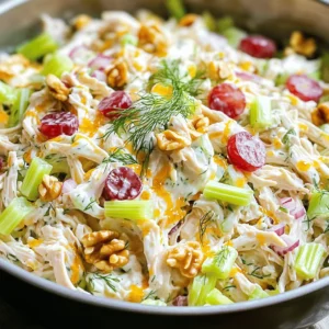 - 2 cups cooked chicken breast, shredded - 1 cup plain Greek yogurt - 1/2 cup celery, finely chopped - 1/2 cup red grapes, halved - 1/4 cup red onion, finely chopped - 1/4 cup walnuts, roughly chopped The main ingredients create a tasty and colorful dish. I love using cooked chicken breast, as it keeps the salad light. The Greek yogurt adds creaminess without extra fat. Chopped celery brings a nice crunch, and red grapes add a sweet touch. The red onion gives a bit of zing, while walnuts add more texture. - 1 tablespoon Dijon mustard - 1 tablespoon honey - 1 tablespoon fresh lemon juice - Salt and freshly ground black pepper, to taste - 1 teaspoon fresh dill, chopped (optional) For the dressing, I mix Dijon mustard with honey and lemon juice. This combo balances sweet and tangy flavors. I like to season it with salt and pepper for taste. Fresh dill is optional but gives an aromatic hint. When you whisk it all together, it makes the salad even better. 1. In a large mixing bowl, combine the shredded chicken, plain Greek yogurt, finely chopped celery, halved red grapes, diced red onion, and chopped walnuts. 2. Stir gently to mix the ingredients without breaking the grapes. 3. In a separate small bowl, whisk together the Dijon mustard, honey, fresh lemon juice, a pinch of salt, and a few grinds of black pepper until the mixture is smooth. 1. Drizzle the dressing over the chicken mixture. 2. Using a spatula or a wooden spoon, fold the dressing into the salad gently. This ensures every ingredient gets coated with the creamy yogurt dressing. 3. If you like, sprinkle the chopped fresh dill into the salad and fold it in for an aromatic touch. 1. Cover the mixing bowl with plastic wrap or a lid. Place the salad in the refrigerator for at least 30 minutes. This helps the flavors meld and become richer. 2. For serving, scoop portions onto a bed of crisp lettuce. You can also use the salad as a hearty filling for sandwiches or wraps. 3. For a nice touch, garnish with a sprig of fresh dill or a sprinkle of extra chopped walnuts. Serve with lemon wedges on the side for extra freshness. To make the best Greek yogurt chicken salad, you want to mix the ingredients gently. This keeps the grapes whole and adds a nice touch to the dish. As you mix, be careful not to crush the grapes. Once you combine everything, taste the salad. You may want to adjust the salt and pepper to your liking. This little step makes a big difference. Garnishing your salad makes it look even better. I suggest adding a sprig of fresh dill on top. This adds color and a nice aroma. You can also sprinkle some extra chopped walnuts for extra crunch. For serving, add lemon wedges on the side. The bright lemon juice gives a fresh kick when squeezed over the salad. You can serve this salad on a bed of crisp lettuce or use it as a filling for sandwiches or wraps. Enjoy the light, tasty meal! {{image_4}} You can change the protein in your salad easily. Turkey works great if you want a twist. Tofu is a good choice for a vegetarian option. Both give a nice texture and taste. Feel free to add different fruits or nuts too. Try diced apples for sweetness. They add crunch and flavor. Pecans bring a buttery note that pairs well with yogurt. If you want to switch up the yogurt, you have options. You can use other types of yogurt like coconut or almond yogurt. These can still keep your salad creamy and tasty. For a lighter meal, think about low-calorie dressings. Vinegar-based dressings can cut calories without losing flavor. You can mix lemon juice with a touch of honey for a fresh twist. Spice up your salad with fresh herbs or spices. Adding parsley or paprika gives it more depth. They can change the whole flavor profile. Want something bolder? Try curry powder for a warm, exotic taste. Chipotle adds a smoky kick. Both can transform your chicken salad into a unique dish. To store your Greek yogurt chicken salad properly, start by placing it in an airtight container. This helps keep it fresh. Make sure to seal the lid tightly. If you have any leftovers, store them right away. The salad can last in the fridge for about 3 to 4 days. Always check for any signs of spoilage before eating. To keep your salad fresh for longer, avoid moisture. This means not adding extra ingredients like fruits or veggies until you are ready to eat. If you need to reheat the chicken salad, do so gently. Heat it in the microwave for a short time. Stir it well, and check the temperature before eating. Enjoy your meal without losing that creamy texture. Yes, you can meal prep Greek Yogurt Chicken Salad. It stays fresh for several days in the fridge. Just mix your ingredients and store them in an airtight container. You can keep the salad in the fridge for up to 4 days. Just make sure it is in a sealed container to maintain freshness. Yes, Greek yogurt is often healthier than mayonnaise. It has fewer calories, less fat, and more protein. This makes it a great choice for a light meal. Yes, you can use frozen chicken. Just make sure to cook it fully before shredding. This adds convenience to meal prep. You can serve this salad with crisp lettuce, in wraps, or on whole grain bread. It also pairs well with fresh fruit or a light soup for a full meal. This Greek Yogurt Chicken Salad is a tasty, healthy dish. You combine simple ingredients like chicken, yogurt, and grapes. The easy steps make it fun to prepare. Chill it for the best flavor, and serve it as a wrap or on lettuce. Remember, you can swap ingredients for variety. Store leftovers properly to enjoy later. This salad is not just delicious; it’s versatile and nutritious. Try it out and make it your own!
