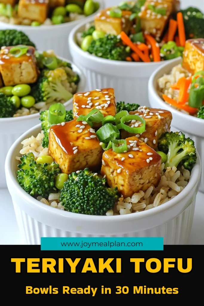 Savor the flavor with these delicious Savory Sesame Teriyaki Tofu Bowls! Perfectly crispy tofu is paired with brown rice or quinoa, steamed broccoli, and colorful carrots, all drizzled in a rich teriyaki sauce. This easy recipe is not only healthy but also visually stunning—ideal for meal prep or a quick dinner. Click to explore the full recipe and impress your taste buds today! #TofuRecipes #HealthyEating #VeganDishes #MealPrepIdeas