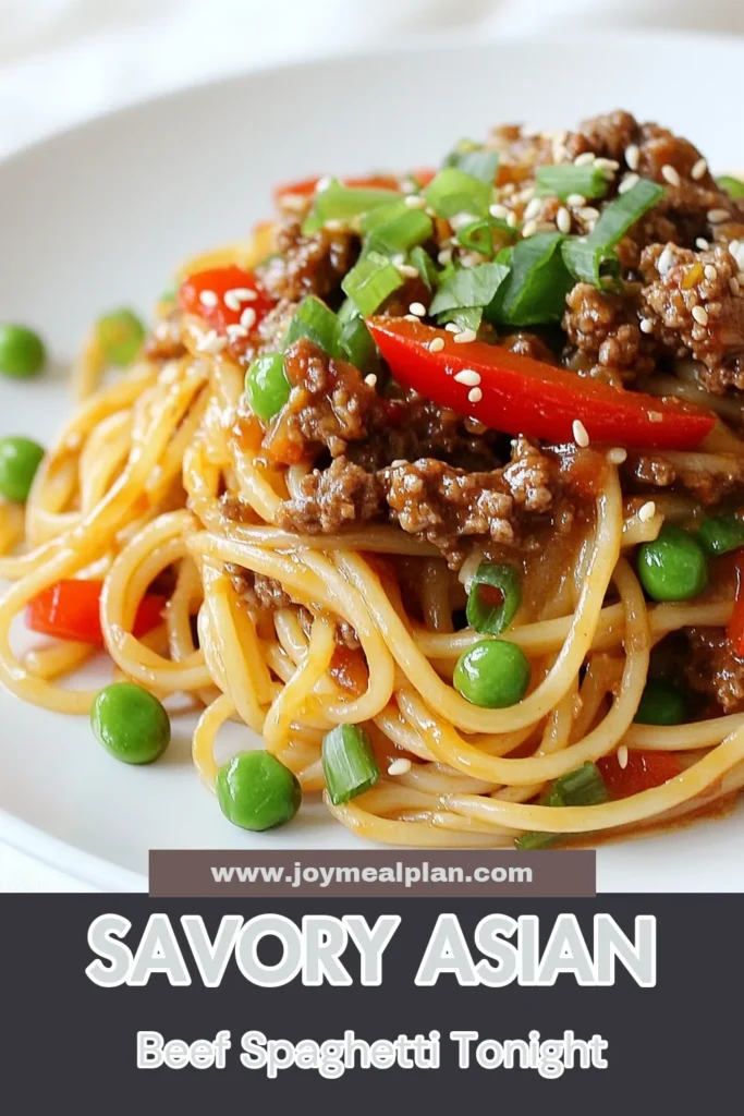 Discover the perfect blend of flavors with this Asian ground beef spaghetti recipe! This quick beef dinner recipe combines savory ground beef stir-fry with spaghetti noodles for a deliciously unique Asian-inspired pasta dish. Ready in just 30 minutes, it's perfect for busy weeknights. Toss together colorful vegetables and a rich sauce for an unforgettable meal. Try this spaghetti noodles recipe tonight! #AsianGroundBeefSpaghetti #QuickDinner #PastaRecipes #BeefStirFry