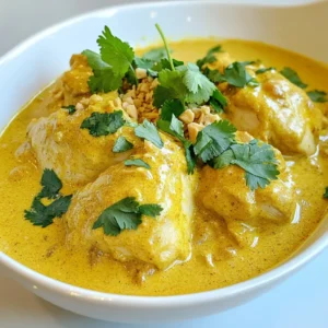 - 500g boneless chicken thighs - 1 large onion - 2 cloves of garlic - 1 tablespoon fresh ginger - 1 tablespoon garam masala - 1 teaspoon ground cumin - 1 teaspoon ground coriander - ½ teaspoon ground turmeric - Salt, to taste - 3 tablespoons plain yogurt - 1 cup full-fat coconut milk - 2 tablespoons ground almonds - Fresh cilantro, chopped - Vegetable oil In this recipe, I use simple but tasty ingredients. The chicken thighs are perfect for a tender bite. They soak up flavors well. I slice the onion to add sweetness. Garlic and ginger give a nice kick. The spices are key. Garam masala adds warmth. Ground cumin and coriander bring depth. Turmeric gives a lovely color and a hint of earthiness. Salt is important to balance all the flavors. For creaminess, I use yogurt and coconut milk. The yogurt helps tenderize the chicken. Coconut milk adds richness and a smooth texture. Ground almonds add a nice nutty flavor. Finally, fresh cilantro brightens up the dish. It adds a pop of color and freshness. Vegetable oil is used for cooking. It helps in sautéing and getting those onions golden brown. This mix of ingredients brings the korma to life. They work together to create a rich and tasty dish. {{ingredient_image_2}} - Combine chicken, yogurt, turmeric, and salt. - Cover and refrigerate for 30 minutes. Start by mixing the chicken pieces with yogurt, turmeric, and salt in a bowl. The yogurt makes the chicken tender and adds flavor. Cover the bowl and place it in the fridge for 30 minutes. This step helps the flavors blend well into the chicken. - Heat oil and caramelize onions. - Add garlic and ginger, cooking until aromatic. Next, heat vegetable oil in a large skillet over medium heat. Add the sliced onion and cook until golden brown. This should take about 5 to 7 minutes. The caramelized onions add sweetness. After that, add minced garlic and grated ginger. Stir them for 1 to 2 minutes until they smell great. - Add marinated chicken and sauté until cooked. - Incorporate spices for flavor enhancement. Now, add the marinated chicken to the skillet. Stir it often, cooking until it turns white. This takes about 5 minutes. Then, sprinkle in the garam masala, cumin, and coriander. Cook for another 2 minutes to let the spices release their flavors. - Stir in coconut milk and ground almonds. - Simmer to blend flavors and cook chicken thoroughly. Gradually pour in the coconut milk while stirring. Mix in the ground almonds for creaminess. Bring the mixture to a gentle simmer. Cover the skillet and let it cook for 20 minutes. This makes the chicken tender and lets all the flavors blend. - Adjust salt as needed. - Garnish with cilantro before serving. After cooking, taste the korma. Adjust the salt if needed. Just before serving, add freshly chopped cilantro on top. This gives a nice color and fresh flavor. Enjoy your easy chicken korma! Marinating chicken is key for great flavor. I mix chicken with yogurt, turmeric, and salt. This blend makes the chicken tender and tasty. I let it sit in the fridge for at least 30 minutes. The longer it marinates, the better it tastes. To get caramelized onions, slice them thin. Heat oil in a large skillet over medium heat. Add the onions and stir often. Cook until they are golden brown, which takes about 5-7 minutes. This step adds depth to your dish. If you want more flavor, try adding spices. A pinch of cinnamon or cardamom can enhance your korma. You can also add a touch of chili for heat. Each spice adds a unique twist to the dish. Fresh herbs can brighten the korma. Chopped cilantro adds freshness when you serve it. You can also use mint for a different flavor. Adding herbs right before serving keeps them vibrant. For sides, basmati rice is perfect with chicken korma. The rice absorbs the sauce well. Warm naan bread is another great option. You can scoop up the korma with it. For a great presentation, use a deep bowl for serving. Drizzle a bit of coconut milk on top. Sprinkle more chopped cilantro for color. This makes your meal look as good as it tastes. Pro Tips Marination Magic: Allow the chicken to marinate longer than 30 minutes if possible, as this will deepen the flavors and tenderness of the meat. Spice Toasting: Toast the spices lightly in the pan before adding the chicken for an enhanced aroma and depth of flavor in your korma. Coconut Creaminess: For an extra creamy texture, use full-fat coconut cream instead of coconut milk, which will make your korma even richer. Garnish Generously: Don’t skimp on the fresh cilantro; it adds a refreshing contrast to the creamy sauce and elevates the dish visually and flavor-wise. {{image_4}} You can switch chicken for paneer or vegetables. Paneer gives a creamy texture. It absorbs spices well and is vegetarian. For a veggie korma, use mixed vegetables like carrots and peas. You can also add sweet potatoes for extra sweetness. Another twist is using different nut pastes for creaminess. Cashew or pistachio pastes add a rich, nutty flavor. They also enhance the dish's texture. To make a mild korma, reduce the spices. Use less garam masala and cumin. You can also skip the chili peppers. If you want heat, add fresh chili peppers. Slice them and stir them in with the garlic and ginger. For a deeper spice flavor, consider using red chili powder. This lets you control the heat level easily. A slow cooker makes cooking simple. Just add all ingredients and let it cook. This method gives the chicken time to absorb all the flavors. For a quicker option, use an Instant Pot. Cook everything on high pressure for about 10 minutes. This saves time while keeping the korma tender and tasty. Both methods work well and provide delicious results. To store your chicken korma, let it cool first. Place the korma in an airtight container. This keeps it fresh and safe. You can keep it in the fridge for up to three days. Enjoy the flavors, but use it quickly for the best taste. You can freeze chicken korma for up to three months. Use a freezer-safe container or bag. Make sure you remove as much air as possible. When you are ready to eat, thaw it overnight in the fridge. For reheating, use the stovetop for best results. Place the korma in a pan over low heat. Stir often to keep it from sticking. You can also use a microwave. Heat in short bursts to avoid overheating. Adding a splash of coconut milk can help keep the flavor and texture. Making Easy Chicken Korma takes about one hour. Here’s the breakdown: - Prep time: 30 minutes, including marinating the chicken. - Cook time: 30 minutes to sauté and simmer the dish. Yes, you can replace coconut milk. Use heavy cream or almond milk. Both will change the taste. Heavy cream gives richness, while almond milk offers a lighter flavor. Chicken Korma pairs well with: - Steamed basmati rice - Warm naan bread - Raita (yogurt sauce) for a cool side These sides make a complete meal and balance the flavors. Chicken Korma has some healthy aspects. It has protein from chicken and healthy fats from coconut milk. To make it lighter: - Use less oil - Substitute yogurt for cream - Add more vegetables for fiber Yes, you can prep Chicken Korma ahead of time. Here are some tips: - Marinate the chicken the night before to enhance flavor. - Store it in the fridge for up to three days. - Reheat gently on the stove to keep it tender. This blog post shared how to make easy chicken korma from scratch. We covered key ingredients, cooking steps, and helpful tips. You learned about marinating chicken, sautéing onions, and making a creamy sauce. In closing, chicken korma is a delicious dish you can customize. Feel free to try different ingredients or adjust the spice level. Enjoy exploring this rich meal!