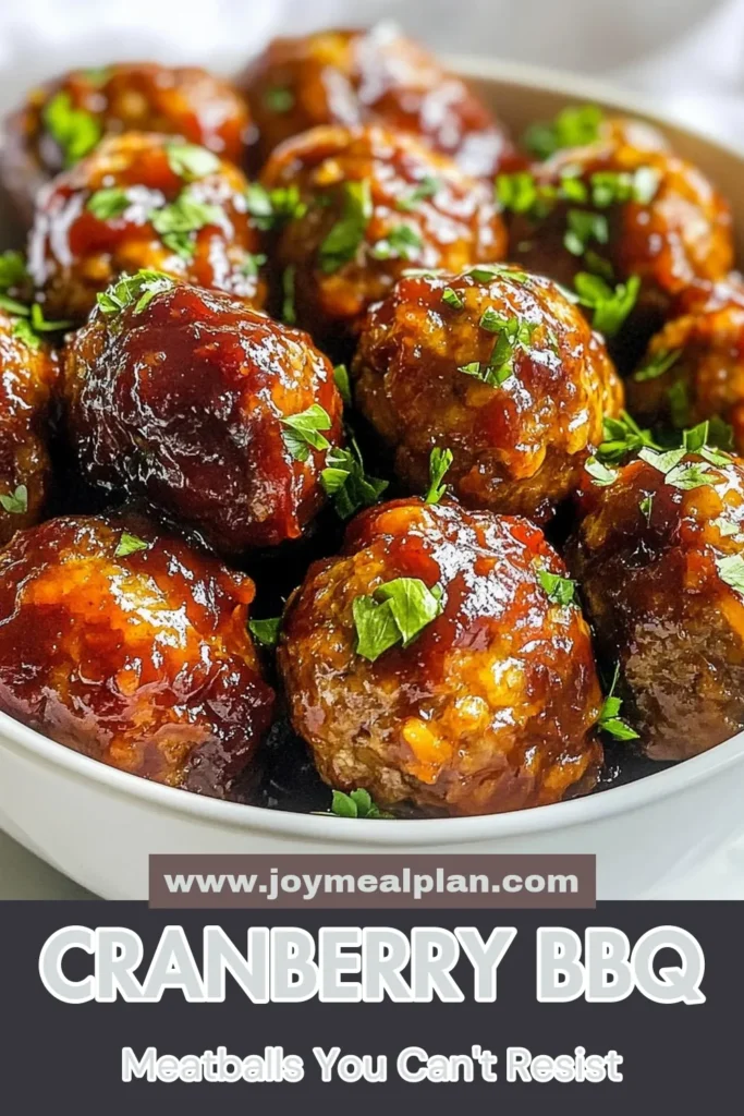 Indulge in these delicious Cranberry BBQ meatballs with our easy slow cooker meatball recipe! Perfect as easy meatball appetizers, these ground beef meatballs with sauce are cooked to tender perfection. Just mix, shape, and let your slow cooker do the work! Ideal for gatherings, they're a hit everyone will love. Try this flavorful cranberry sauce meatballs recipe today! Save for your next party. #CranberryBBQMeatballs #SlowCookerRecipes #EasyAppetizers #GroundBeefMeatballs