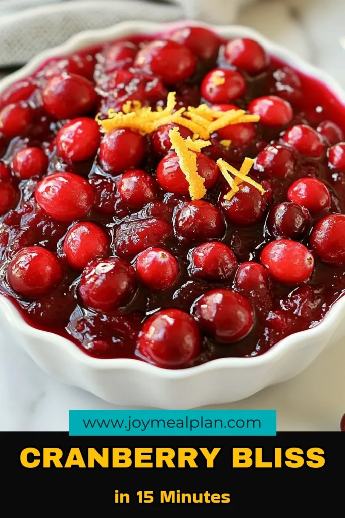 Create a delightful addition to your holiday meals with this small batch cranberry bliss sauce recipe! Enjoy the tartness of homemade cranberry sauce sweetened with granulated sugar and a splash of fresh orange juice. Enhance your fresh cranberry dessert with a hint of orange zest and optional nuts for texture. This easy cranberry sauce recipe takes just 15 minutes to make. Save this recipe for your festive gatherings! #CranberrySauce #HomemadeCranberrySauce #HolidayRecipes #EasyDesserts